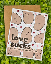 Load image into Gallery viewer, Funny Anti-Valentine’s Day Card – “Love Sucks…But Potatoes Are Forever” – Sarcastic, Sassy, Food-Themed Greeting Card
